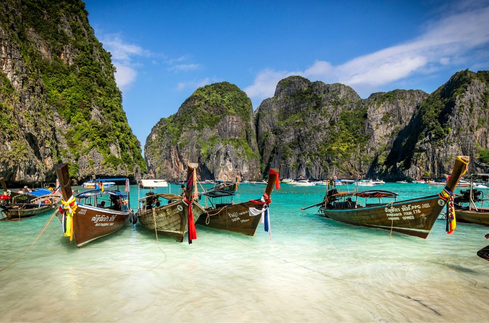 phi phi island with boats on the shore